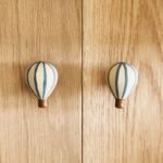 Heteluchtballonknopjes op kastdeuren